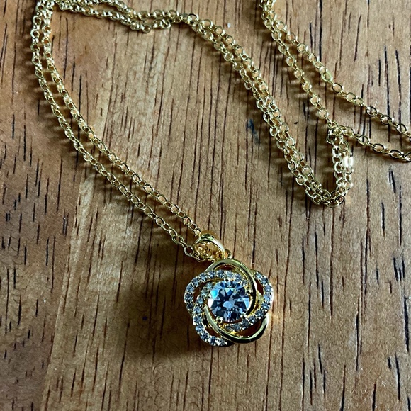 Danbury Mint Jewelry - Diamonisse NWOT diamond necklace Love knot pendant 14k plated gold Statement